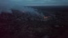 Пожары и дым в Угледаре во время обстрелов города армией РФ. Донецкая область, 26 января 2023 года