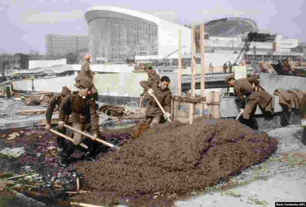 Servicemen working on construction of the Olympic facilities in May 1980. The boycott was a huge blow to the Kremlin, which was already grappling with deep financial strife and had spent some $1.35 billion to stage the prestigious event.