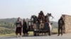 Afghan security personnel deployed in the Zazai Maidan district of Khost Province near the border with Pakistan on October 12 