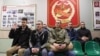 Recruți la un birou local de recrutare înainte de a pleca în serviciul militar în armata rusă - 15 octombrie 2024.