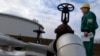 A Hungarian engineer works at the receiving area of the Druzhba oil pipeline at an oil refinery south of Budapest. (file photo)